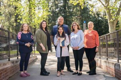 From left to right: Lisa Aduna-Haas, Ronda Marr, Isaura Marca, Danny Castillon, Norine Holguin and Fidelma O’Neill.