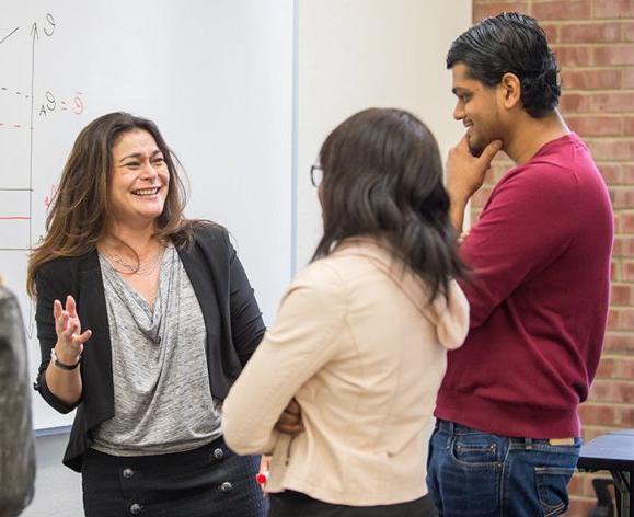 the professor talking to students